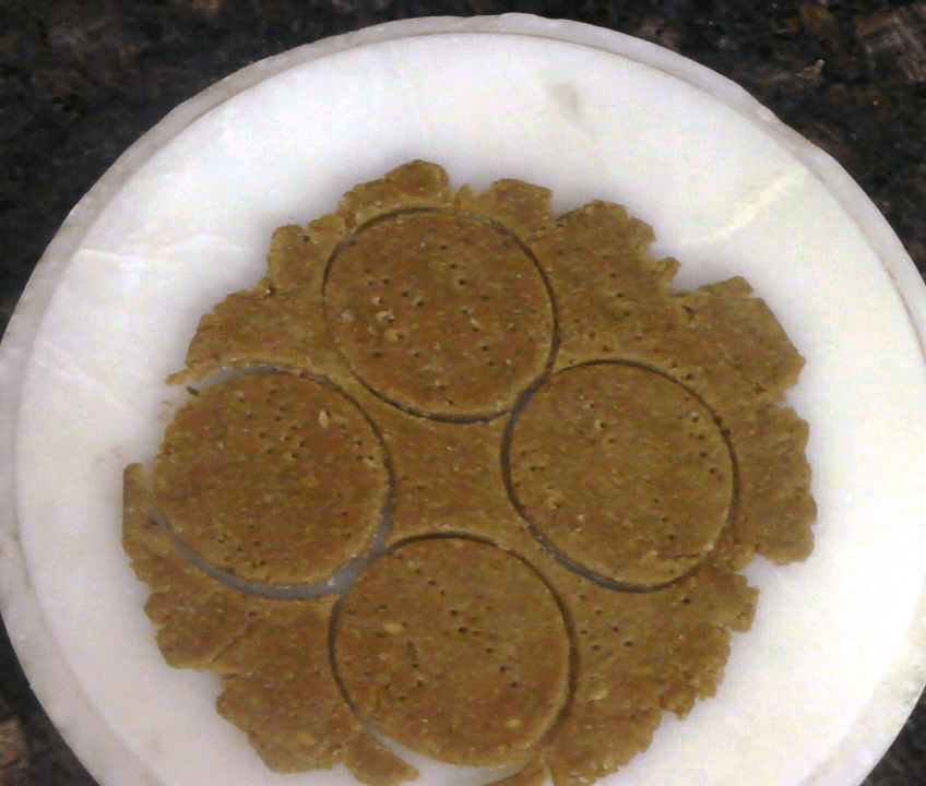 Oats and wheat flour sweet mathri made with jaggery